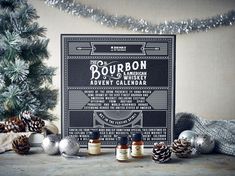 an advertisement for bourbon advertises whiskeys and other holiday items in front of a christmas tree