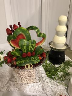 there is a fruit arrangement on the table