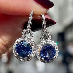 Gorgeous, Deep Blue Gemstone Earrings Surrounded By Crystal Stones. 925 Silver Plated Synthetic Stones Would Be Beautiful For A December Birthday Or Any Dressy Occasion. Lots Of Sparkle. New, Never Worn, Did Not Come With Any Tags. Blue Round Earrings For Anniversary, Sapphire Earrings With Halo Setting For Gift, Sapphire Earrings With Halo Setting As Gift, Silver Sapphire Earrings For Party, Silver Sapphire Earrings With Sparkling Stones, Blue Halo Design Earrings As Gift, Blue Cubic Zirconia Round Earrings, Blue Halo Setting Earrings For Gift, Sapphire Birthstone Earrings