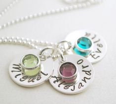 "This custom, hand stamped necklace is personalized with the names and birth month crystals of your choice. This beautiful sterling silver necklace is hand stamped with three names of your choice and corresponding bezel set birthstone. (If you need a necklace with more or fewer discs, and you don't see my listing fitting your needs, please convo me and I can set up a reserve listing for you). Each sterling silver disc is 5/8\" and is slightly domed to give it a wonderful finished appearance. Max Month Crystals, Mom Necklace Personalized, Hand Stamped Necklace, Custom Gift Boxes, Custom Name Necklace, Mom Necklace, Birth Month, Pricing Jewelry, Sterling Silver Bead