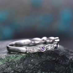 - Metal: Solid gold(10K/14K/18K white/yellow/rose gold),925 sterling silver,platinum available- Stone: natural purple amethysts and natural conflict free diamonds,SI-H Clarity and Color- Band Width: 1.4mm- Can be personalized: Yes Purple Rings With Diamond Accents For Wedding, Purple Diamond Ring With Diamond Accents For Anniversary, Purple Diamond Ring With Accents For Anniversary, Amethyst Diamond Ring With Diamond Accents In White Gold, Elegant Stackable Round Amethyst Ring, White Gold Amethyst Diamond Ring With Accents, Wedding Amethyst Diamond Ring With Diamond Accents, Elegant Amethyst Stackable Wedding Rings, Purple Half Eternity Ring For Anniversary