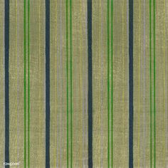 a green and blue striped rug with vertical stripes on the bottom, along with horizontal lines across the top