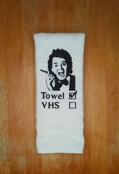 "This is the ultimate Christmas gift that is guaranteed to make any Scrooged movie fan smile! Bill Murray's character in the movie had a choice of a towel or a VHS for his Christmas list recipients... Towels were the obvious choice in the movie and now in person.. hilarious!   This hand towel is washable and durable. The embroidered design of 'Bill Murray/Towel' is 7.25\"x4.5\", and the towel dimensions are 29\"x16\". I am open to bulk orders. If you would like to see this design on another prod Scrooged Movie, Bill Murray Art, Movie Christmas, Holiday Gift List, A Christmas Carol, Bill Murray, Funny Holiday, Ultimate Christmas, Embroidered Towels