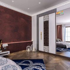 a bedroom with wood flooring and walls painted in shades of brown, white and blue