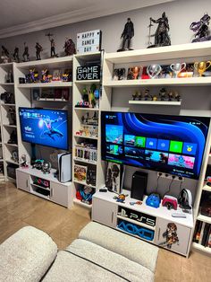 a living room filled with lots of toys and games on top of bookshelves