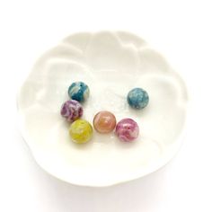 "Feeling creative? This list is for individual, single round beads to design your own beautiful keepsakes. Standard beads will be 12mm with a 1mm hole, ready for you to create your own jewelry. (Additional bead and hole sizes available upon request.) I do use a hard outer sealant to protect the bead and give it a glossy finish. The finish makes the bead water resistant, however, not water proof. I do not recommend bathing or swimming while wearing the beads. Please note, these beads do not fit o Round Spacer Beads For Gifts, Hypoallergenic Necklace With Round Beads For Gift, Hypoallergenic Necklaces With Round Beads For Gifts, Hypoallergenic Round Bead Necklaces For Gifts, Hypoallergenic Round Bead Necklace For Gifts, Flower Charm Jewelry With Round Beads For Gift, Multicolor Flower Charm Jewelry With Round Beads, Round Beads Jewelry With Flower Charm For Gift, Round Polished Beads For Crafting Jewelry