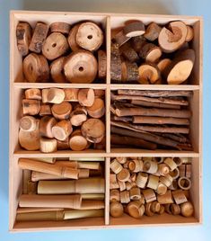 a wooden box filled with lots of different types of wood