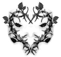 a black and white photo of leaves on the side of a face with an intricate design