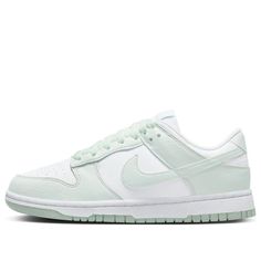 The Nike WMNS Dunk Low Next Nature 'White Mint' offers a modern twist on a classic silhouette. The model is composed of 50% recycled materials, ensuring a more sustainable way to wear your favourite Dunks. The upper combines a powerful palette of white and Mint shades, forming an unforgettable two-tone design that honours some of Nike’s thinnest classic models. Finished with matching soles and woven tongue labels, this shoe is perfect for those looking to make a statement while respecting the environment. Experience the class and sustainability of the enduring Dunk proof in the Nike WMNS Dunk Low Next Nature 'White Mint'. Nike Dunk Low Next Nature, Dunk Lows, Preppy Shoes, Nike Models, Baskets Nike, Adidas Spezial, Nike Dunk High, Cute Nikes