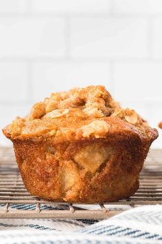 apple oatmeal muffins on a cooling rack with text overlay