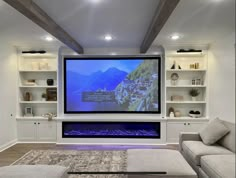 a large screen tv mounted to the side of a wall