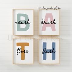 three wooden blocks with the words brush, floss, and alphabet in different colors