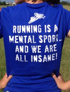 a woman wearing a running is a mental sport and we are all insane