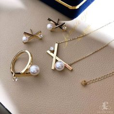 Highlight: Cute and Simple Style Product Information OriginJapan MaterialAkoya Pearl, 18k Gold, and Diamond Dimensions1.0 x 2.2 cm Pearl Shaped: Round Size: 7-7.5 mm Quality: AAA Nacre: Very Thick Color: White Luster: Aurora Accessories Metal: 4.3g of 18k Gold Other: 0.13ct of SI Quality Natural Diamond Including 18k Gold/40-45 cm Adjustable Chain Elegant Plated Jewelry Sets For Anniversary, White Gold Pendant Jewelry Sets For Anniversaries, White Gold Pendant Jewelry Set For Anniversary, Everyday Luxury White Cubic Zirconia Jewelry, Fine Jewelry Sets In White Gold As Gift, Fine Jewelry Sets In White Gold For Gifts, Fine Jewelry Sets With Elegant Design For Gift, Luxury Gold Plated Jewelry Sets As Gift, Formal Jewelry Sets With Round Pearl Pendant