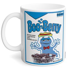 a white coffee mug with an image of boo - berry cereal in the front and on the back