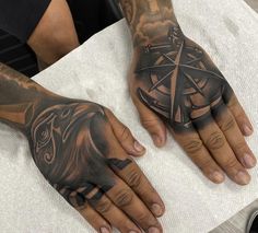 two hands that have tattoos on them and one has a pentagramil in the middle