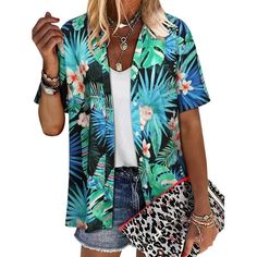 The NFTOEIULA Hawaiian Floral Print Oversized T-shirt is the epitome of summer fashion. This eye-catching piece captures the essence of Hawaiian style with its vibrant floral pattern and offers an oversized fit for ultimate comfort. The soft, cool, and breathable chiffon fabric makes it an ideal choice for the warmer months, ensuring you stay comfortable while looking effortlessly chic. Designed to be versatile, the shirt allows for multiple styles of wear, making it a must-have addition to any Summer V-neck Shirt For Vacation, Trendy Multicolor T-shirt For Vacation, V-neck Shirt For Summer Vacation, Oversized Summer T-shirt, Printed V-neck Hawaiian Shirt For Summer, Hawaiian V-neck Shirt For The Beach, Hawaiian V-neck Beach Shirt, Trendy Multicolor T-shirt For Beach, Printed Blue Shirt For Summer