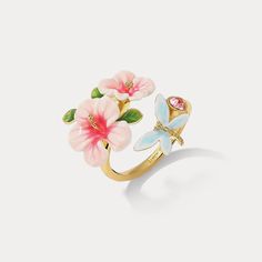 Hibiscus Ring is a piece of fancy jewelry. For its enamel paint, it’s also considered enamel jewelry. You can find it from Selenichast jewelry store. It is easy to wear and very trending. Stunning hibiscus jewelry gives satisfaction to women to add a floral, sweet and elegant touch to their everyday outfits. Lovely hibiscus jewelry that features enameled white-pink blooms, green leaves and a light blue butterfly give us delight in its loveliness and sweetness while its exquisite enameled workman Hibiscus Jewelry, Hibiscus Ring, Jewellery Organization, Dragonfly Ring, Pretty Accessories, Preppy Jewelry, Gloss Labial, Pottery Crafts, Dope Jewelry