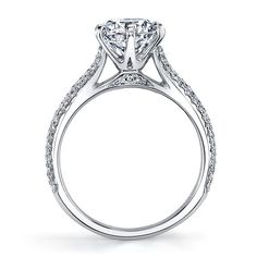 an 18k white gold round diamond engagement ring