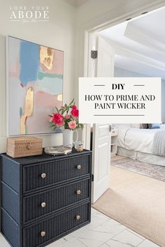 a black dresser with pink flowers on top and the words diy how to prime and paint wicker above it