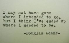 an old typewriter with the words douglas adams written in black ink on white paper