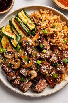 a white plate topped with meat and veggies