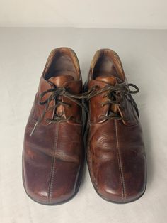 Cole Haan Mens dress shoes size 7.5 color: different shades of brown bag 6d JN Brown Casual Moc Toe Dress Shoes, Casual Low-top Dress Shoes For Semi-formal Events, Brown Low-top Shoes For Business Casual, Brown Low-top Formal Dress Shoes, Masculine Brown Moc Toe Dress Shoes, Brown Low-top Leather Shoes For Business, Masculine Brown Dress Shoes With Round Toe, Masculine Brown Low-top Leather Shoes, Brown Round Toe Dress Shoes