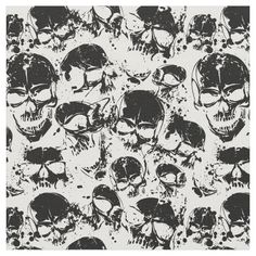 a black and white skull pattern with splattered skulls on the side, as well as