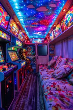 the interior of a vehicle decorated with brightly colored lights and video game machines in it