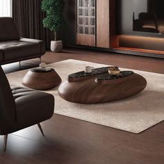 a living room with two brown chairs and a coffee table in front of a flat screen tv