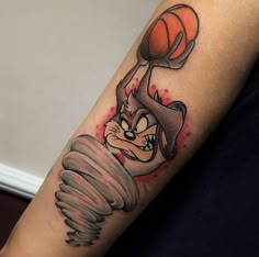 an arm with a cartoon character holding a basketball in it's claws and wearing a hat