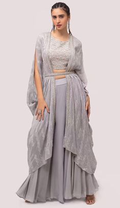 Grey chikankari embroidered crop top and split sleeve long jacket, paired with wide-legged pants and embellished belt. Cape Set, Embellished Belt, Embroidered Crop Tops, Split Sleeve