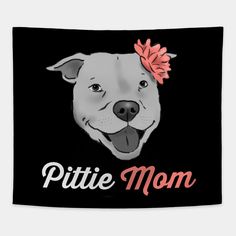 a dog with a pink bow on its head and the words, pittie mom