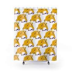 a shower curtain with yellow dogs on it