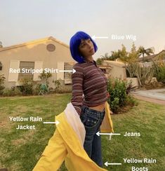 a woman with blue hair standing in front of a house