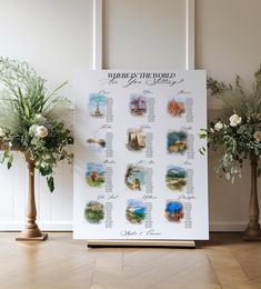 a wedding ceremony sign with flowers and greenery on the floor in front of it