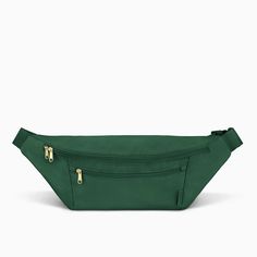 a green fanny bag with gold zippers on the front and side, sitting against a white background