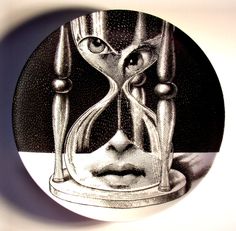 an image of a woman's face with hourglasses in front of her