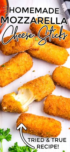 homemade mozzarella cheese sticks recipe on a white plate with parsley and tomatoes