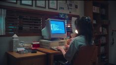 a woman sitting at a desk in front of a computer monitor with the words, for admining her so much