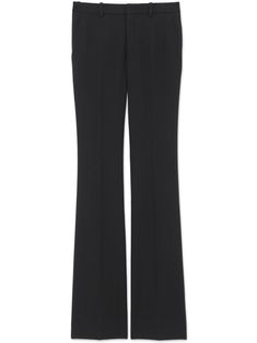 black virgin wool gabardine weave low-rise pressed crease belt loops front hook and eye fastening concealed front zip fastening two side slash pockets two rear button-fastening jetted pockets flared Wool Trousers, Low Rise, Saint Laurent, Trousers, Wool, Black