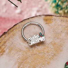 there is a ring that says merry christmas on it