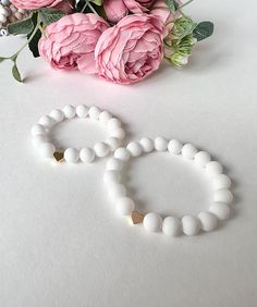 This is a beautiful set of matching mother/daughter beaded bracelets. These make a perfect gift for a mama and daughter duo, or any ladies who want to show their special connection. Matching with your little is always fun and these dainty bracelets make dressing up even more special! Made of: - Silicone White 9 mm beads - 18K gold plated heart bead - Elastic cord Each item is packed in a beautiful organza bag. It makes the perfect gift for Christmas, a baby shower, new mom, Mother's Day, bridal Mama And Daughter, Mother Daughter Bracelet Set, Daughter Bracelets, Bracelets Matching, Daughter Bracelet, Big Bracelets, Mother Daughter Bracelets, Mini Bracelet, Beads Bracelet Design