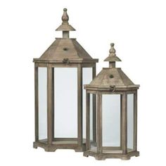 two wooden lanterns sitting next to each other