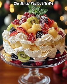 a christmas pavlova trifle with fresh fruit on top