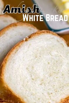 two slices of white bread sitting on top of a cutting board