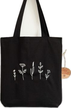 Black Tote Canvas Bag For Spring, Black Embroidered Cotton Shoulder Bag, Black Bags With Floral Embroidery For Spring, Black Embroidered Canvas Tote Bag, Black Floral Embroidered Tote Shoulder Bag, Spring Floral Embroidered Tote Canvas Bag, Spring Floral Embroidered Canvas Tote Bag, Black Cotton Canvas Bag For Summer, Summer Black Cotton Canvas Bag