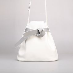 Stylish and elegant, ITOSHIOSHI Bucket Bag from KITAYAMA Studio is featured by its minimalistic design. To limit the use of metal accessory meant to emphasize the nature and purity of the leather. This designer handbag is an eye-catching item for styling. Made of full-grain calf leather and lined with suede lambskin, this bag brings you an elegant look with a quality interior. All Kitayama leather goods are designed and handcrafted in small quantity by experienced craftsmen in the studio and carefully inspected before sending to the customer. KITAYAMA Studio is a handcrafted leather goods brand established in 2015. KITAYAMA designers work with highly experienced craftsmen and utilise genuine premium-quality leather to create designer leather goods. KITAYAMA design emphasises the beauty of Designer Handbag, Metal Accessories, In The Studio, Handcrafted Leather, Leather Design, Good Brands, Best Brand, Leather Goods, Leather Interior