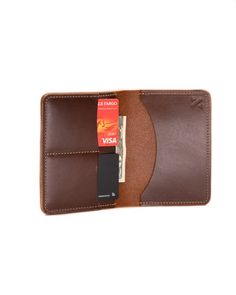 The Passport Wallet can hold all your essentials in one place. Not only is there a spot for your passport, you can fit credit cards, cash and plane tickets in there. Made with vegetable tanned leather. Passport Wallet, Vegetable Tanned Leather, New Bag, Credit Cards, Tan Leather, Credit Card, Wallet, Leather