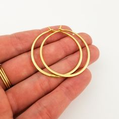 Big and bold, these are the thickest hoops that Aris Designs offers. With a hammered finish that catches the eye, these gorgeous solid gold earrings offer you the chance to elevate your outfit with carefree ease and stand out from the crowd. Gold Hoop Earrings Style, Lifetime Jewelry, Thick Gold Hoops, Thick Hoop Earrings, Special Gifts For Her, Hammered Hoop Earrings, Gold Jewelry Simple, Woman's Fashion, Solid Gold Earrings